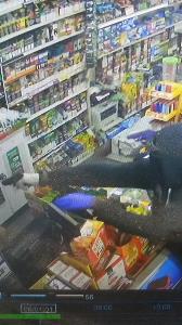 Armed robbery suspects wearing two different gloves Armed robbery suspect wearing two different gloves